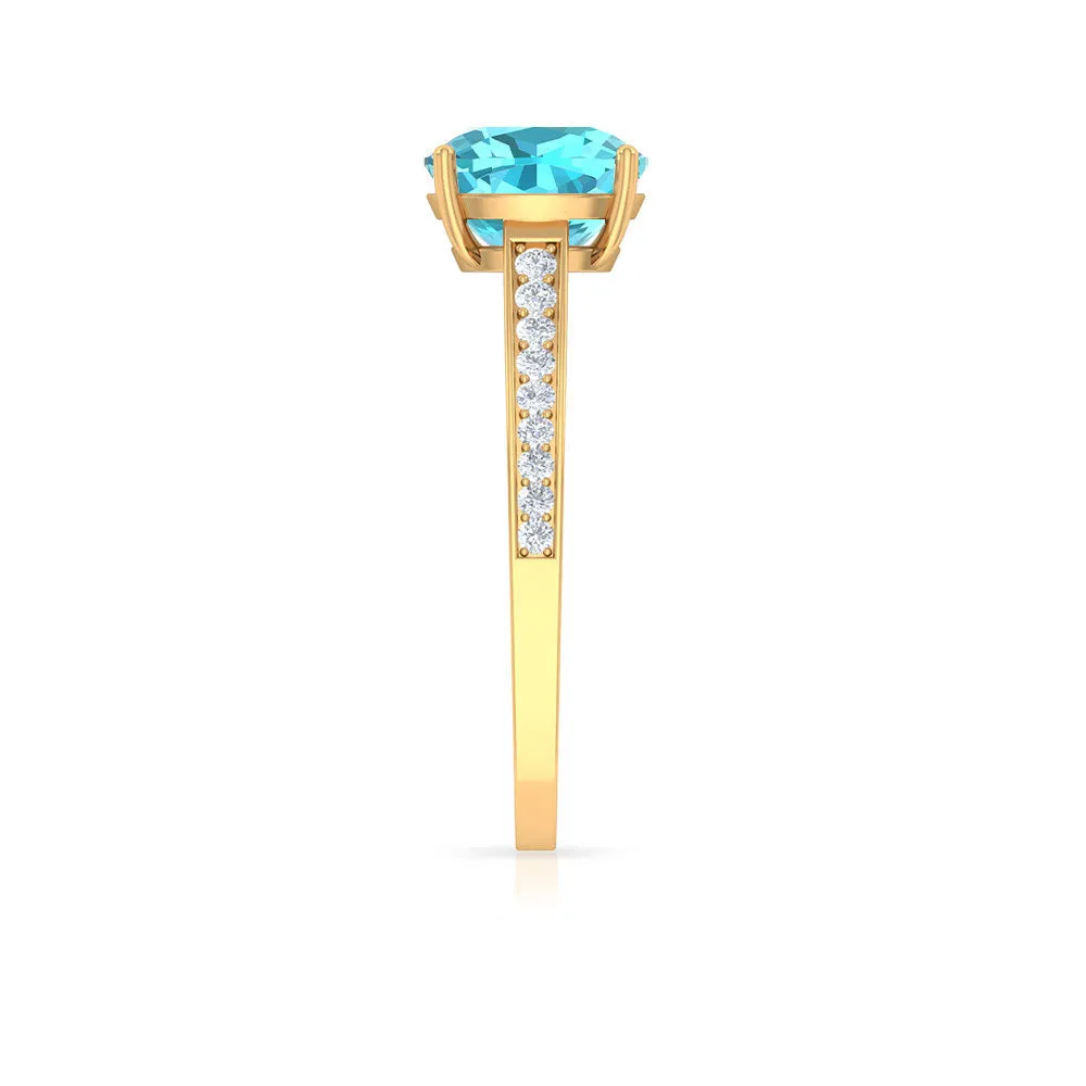 8.5 MM Cushion Cut Swiss Blue Topaz Solitaire with Diamond Side Stone Ring